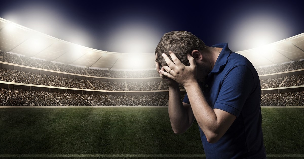 Sad man loses fantasy football